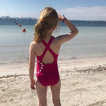Magenta cross-back swimming costume