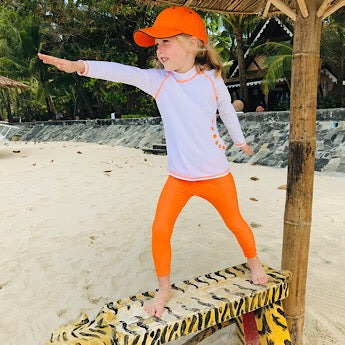 White/ orange long-sleeved rash top (zipped)