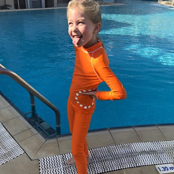 Orange/ white long-sleeved all-in-one swimsuit - age 2/3y