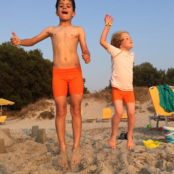 Orange swim shorts