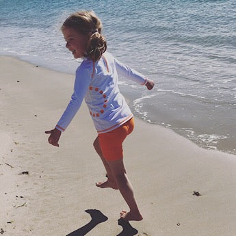 White/ orange long-sleeved rash top (zipped)